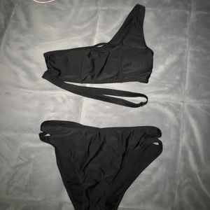 NWOT black swimsuit one shoulder slit bottoms