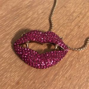 Betsey Johnson lips with fangs necklace