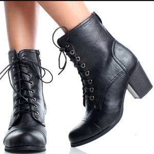 Black heeled combat boots