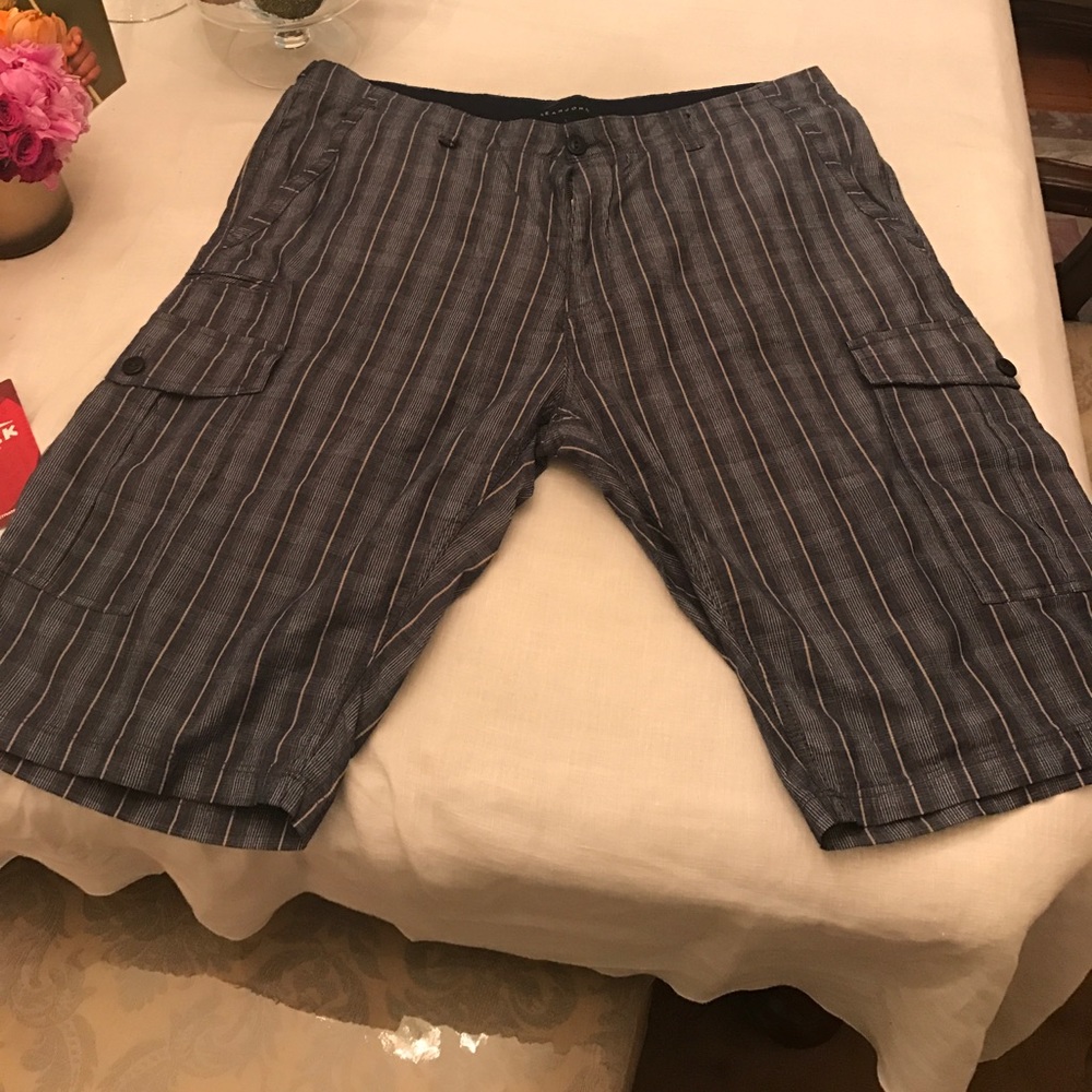 These are Sean John plaid navy blue shorts