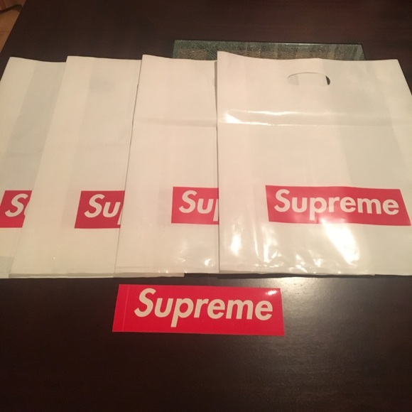 Supreme Other - Supreme bags and a sticker