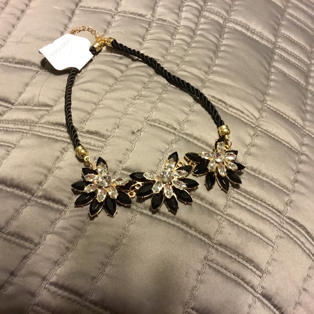 Black white and gold tone statement necklace