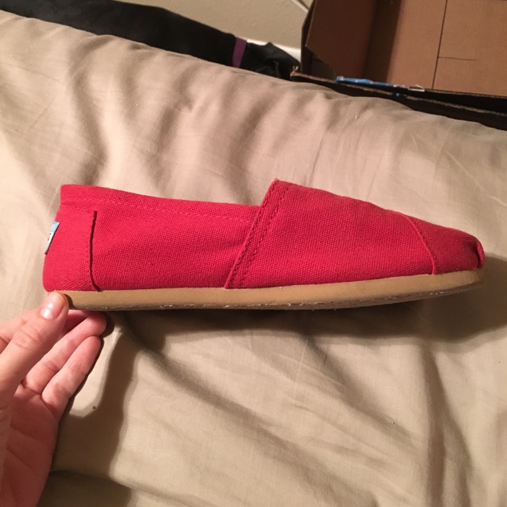 Red TOMS canvas shoes