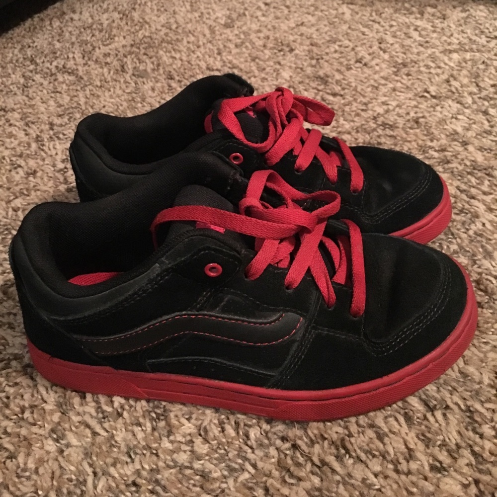 Red and black Vans shoes