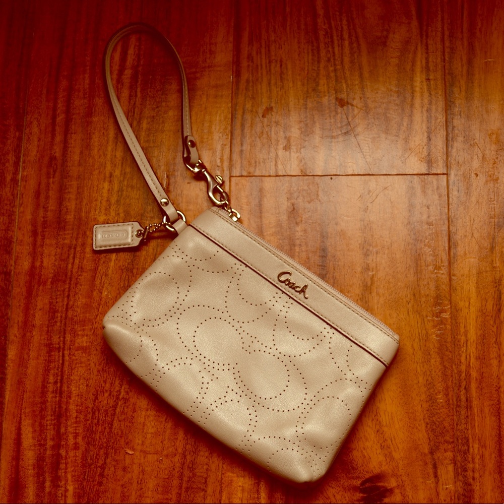 PERFORATED Gray Coach Clutch! ❤️