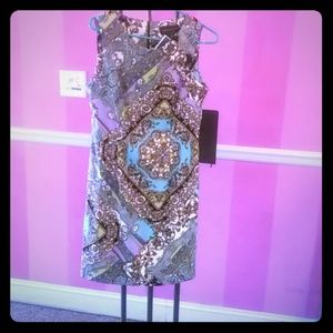 Knee length paisley dress.