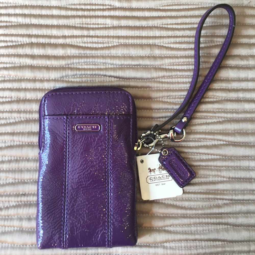 NEW COACH PURPLE UNIVERSAL WRISTLET