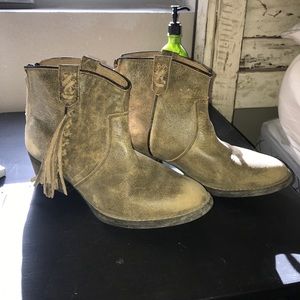 Very volatile fringe booties