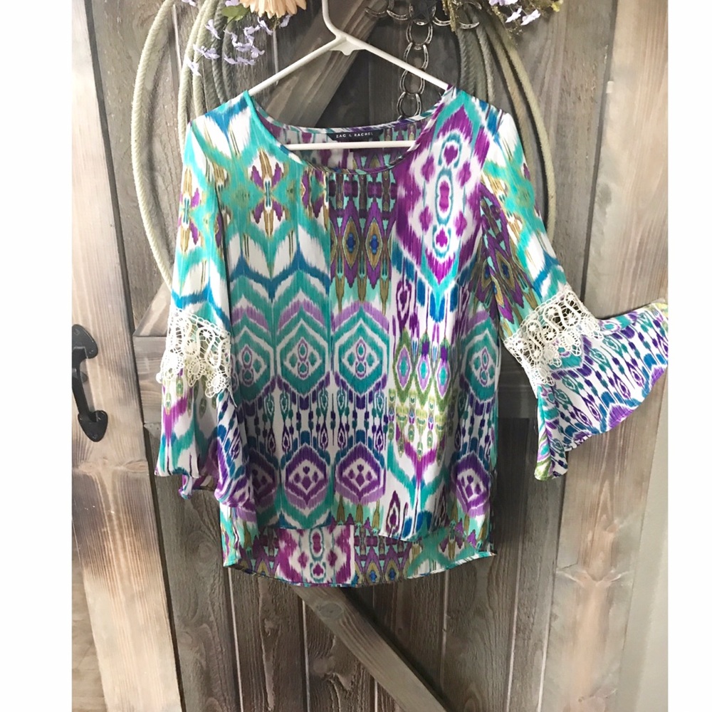 Beautiful bell sleeve blouse.