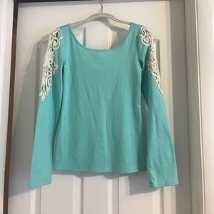 Mint long sleeve with lace cutouts