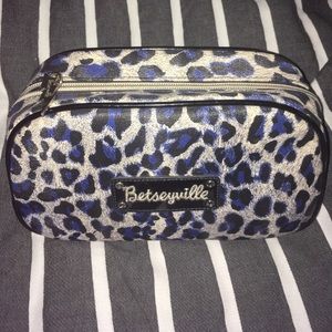 Betsey Johnson blue cheetah print makeup bag.