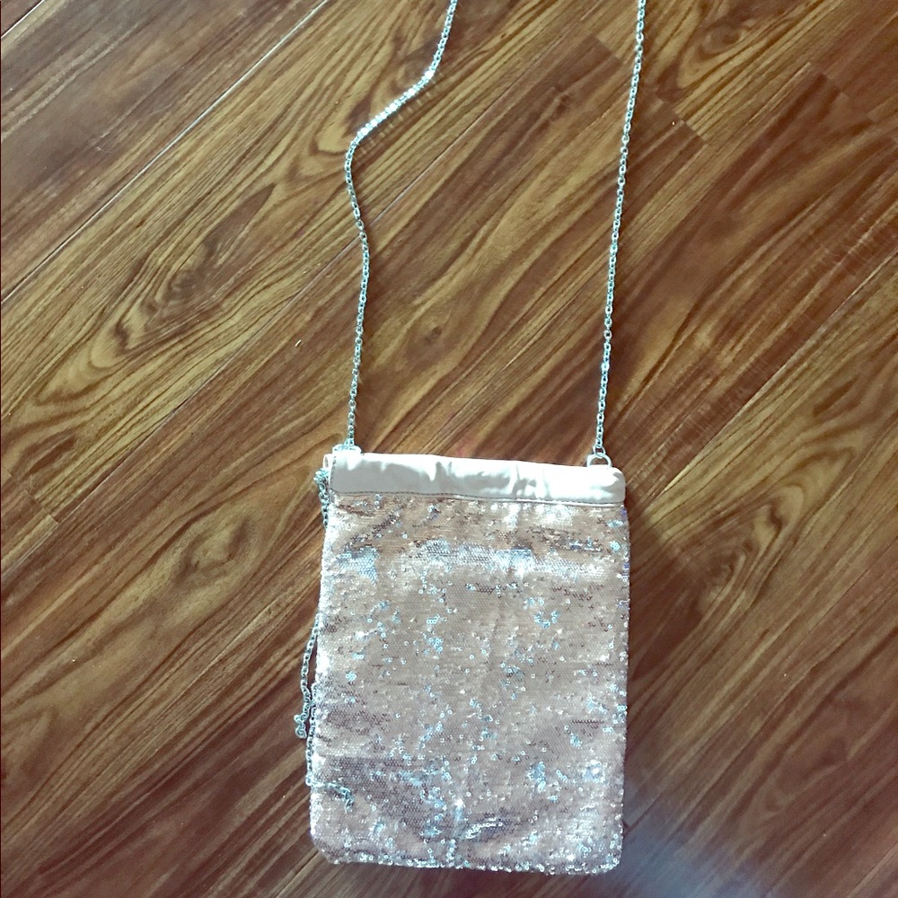 Brand new cross body Rose colored with sequins