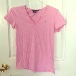 Pink short sleeve shirt with green logo