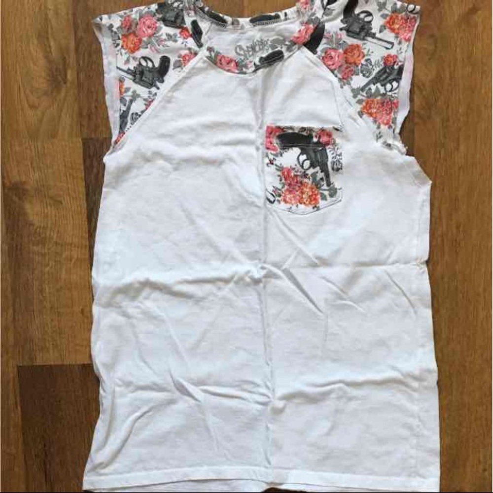 Spencer's sleeveless roses and guns top
