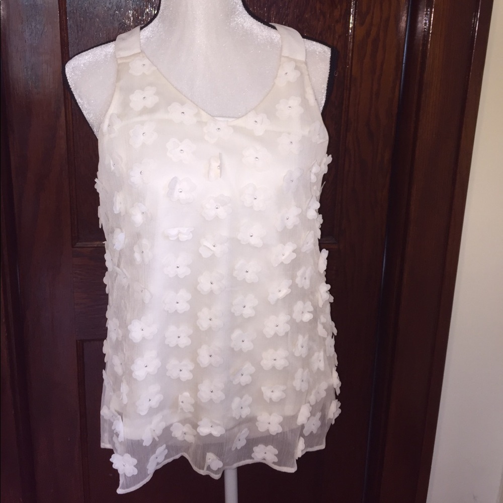 Beige top with flower accents size small
