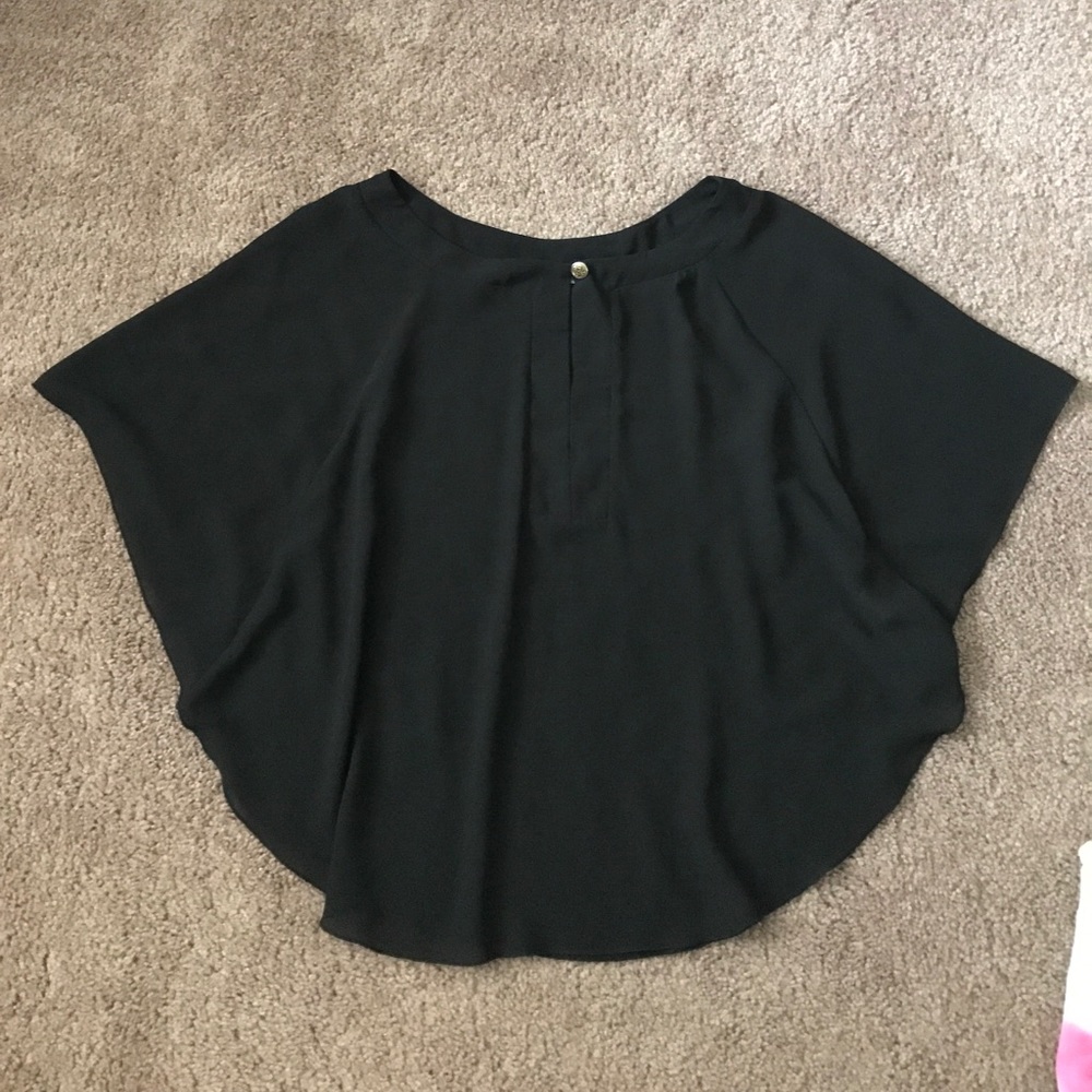 Black fashion top with cleavage slit
