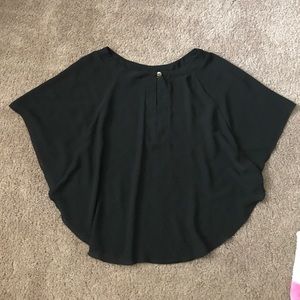 Black fashion top with cleavage slit