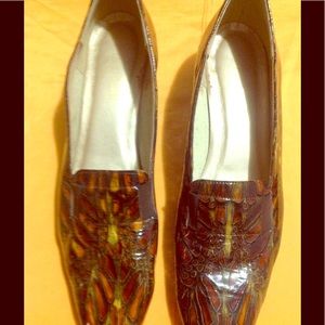 Footwear. Leather low heels brown mixed colors.