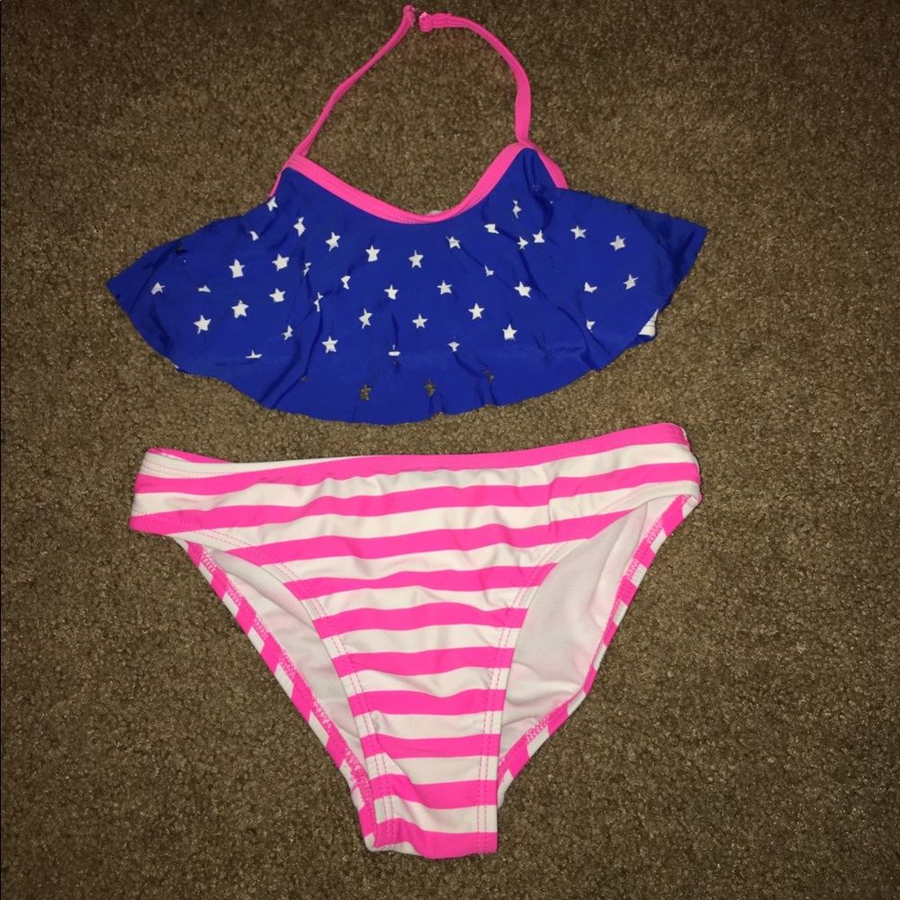 Girls swimsuit $5 or free with purchase