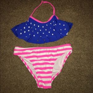 Girls swimsuit $5 or free with purchase