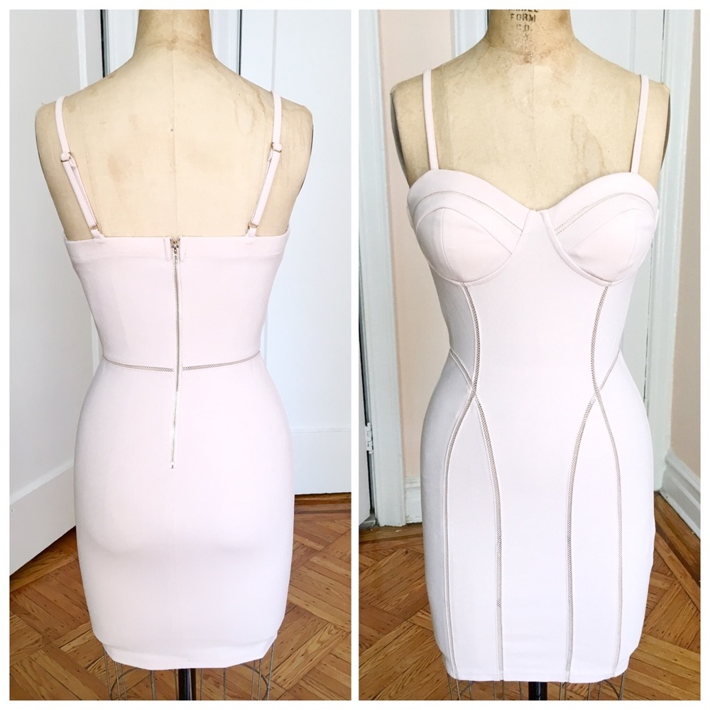 🆕 Nude Bodycon mini dress with cutout design
