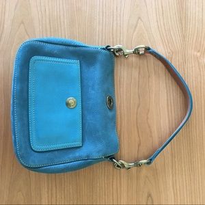 Teal Coach bag with brown leather handle