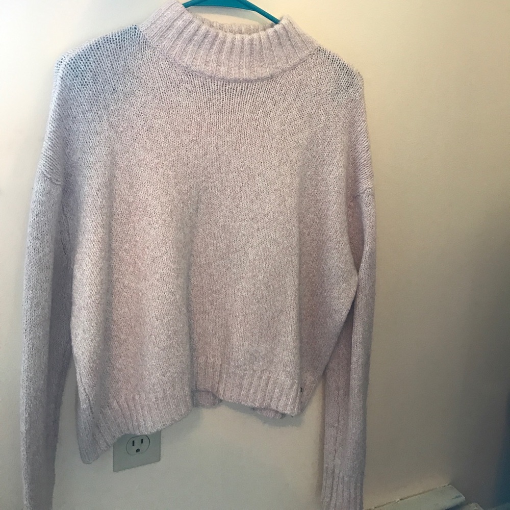Light pink turtleneck sweater