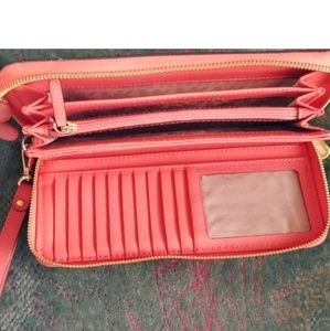 From Jet Set, Authentic Michael Kors wallet/clutch