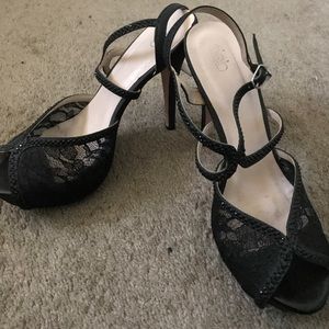 Black lace pumps