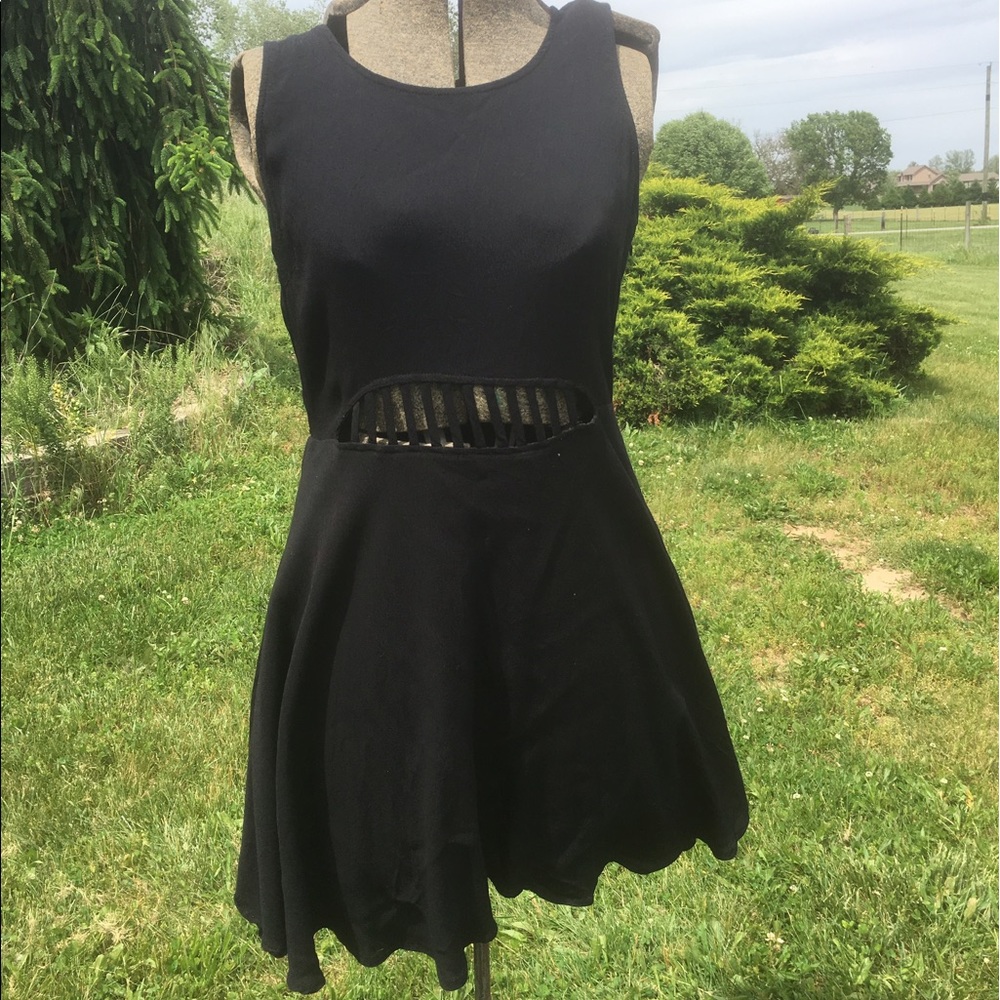 Black dress with stomach cutouts