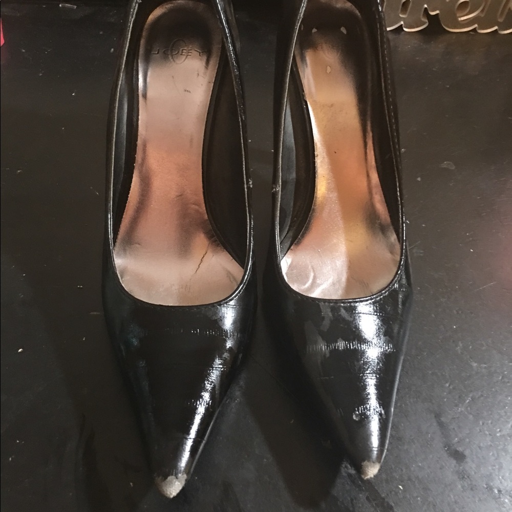 Black leather patterned heels