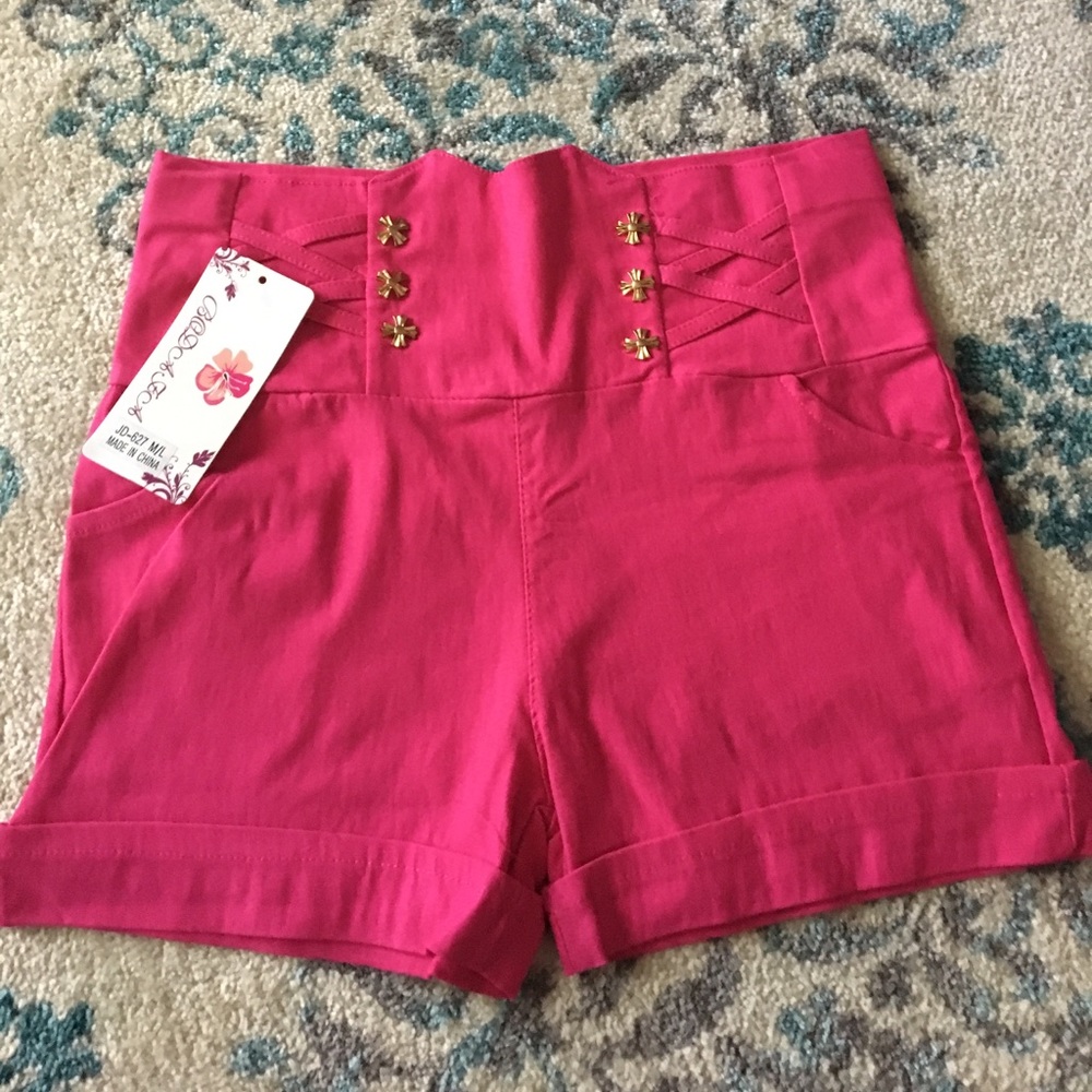 Juniors High waisted fuchsia shorts.