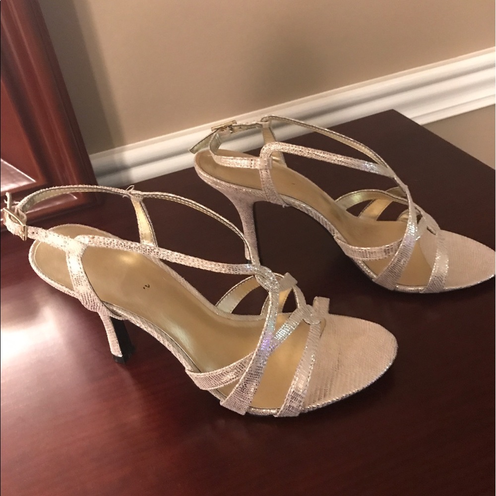 Gold heels. Size 8 1/2 worn a couple times.