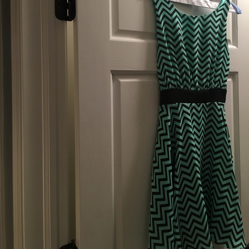 Turquoise and black dress