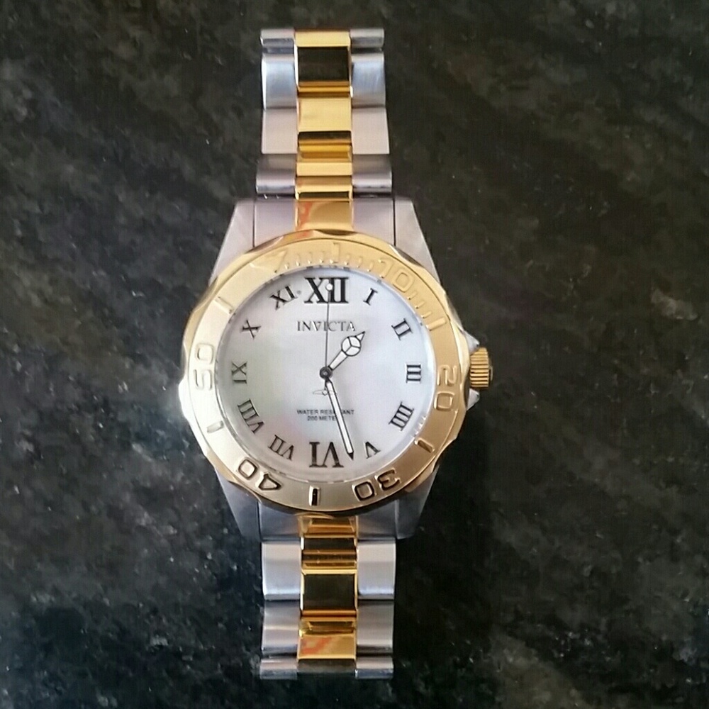 Men watch by INVICTA two tone very good condition