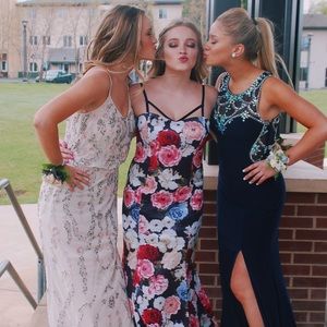 Floral prom dress in the middle of the two girls