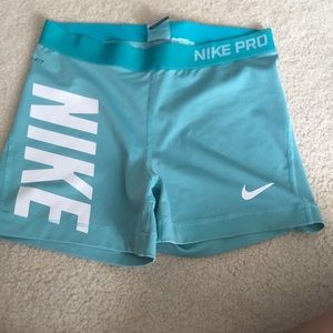 Size large brand new aqua nike pros