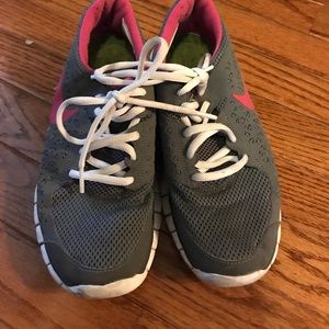 Grey Nike running shoes
