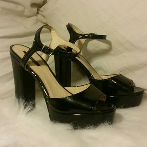 Black patent platform heels