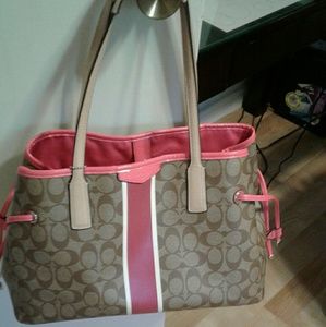 Brown and pink Coach handbag
