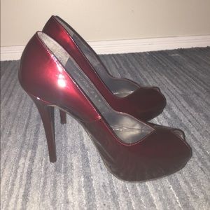 Stuart Weitzman burgundy patent leather pumps