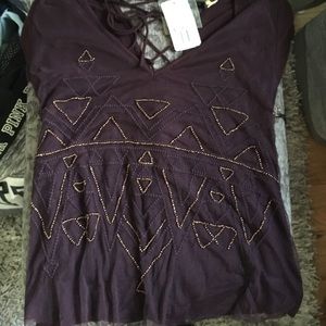 Dark purple shirt with gold bead detailing