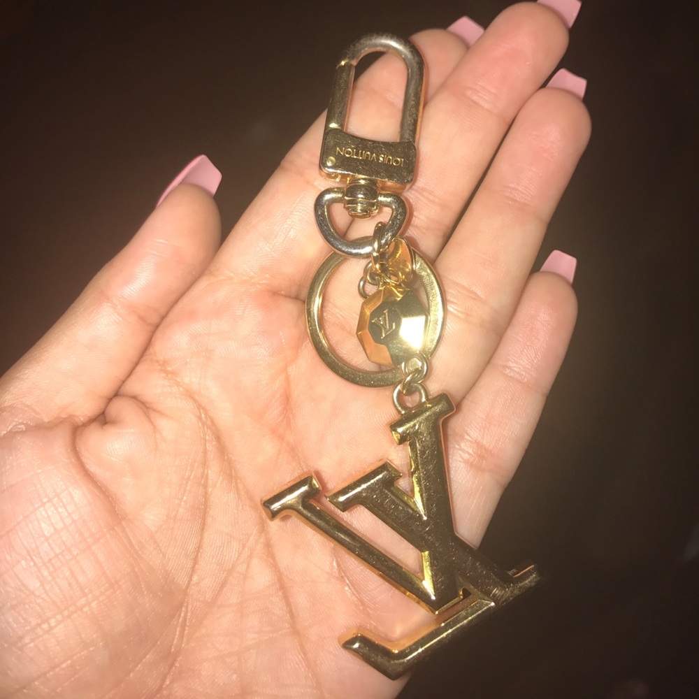 Louis Vuitton gold key accessory clasp