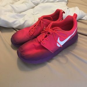 Pink and purple Nike roshes