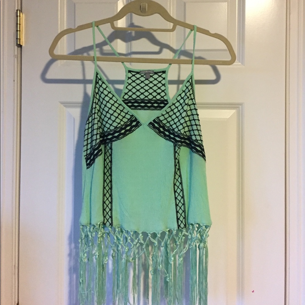 Teal and black V neck top with tie accent bottom