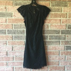 Backless lace dress by Signature 8.