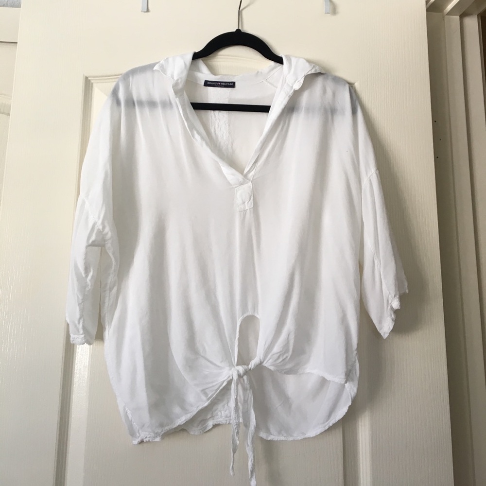 Brandy Melville white flowy shirt.