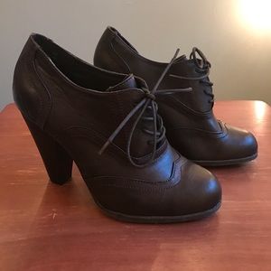 Brown oxford-style heels