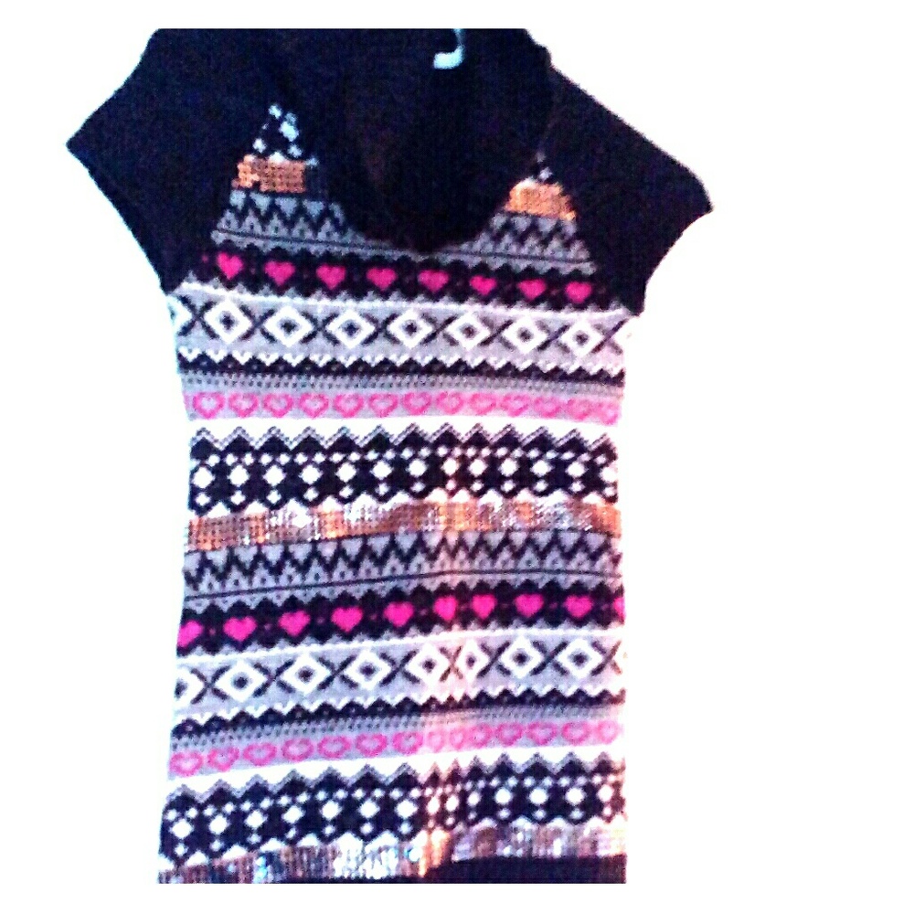 A short sleeved sweater that has a turtleneck