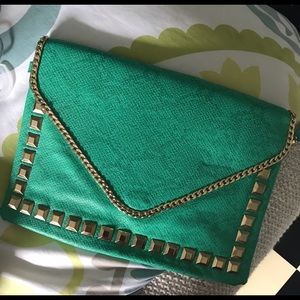 Mint green snake print clutch